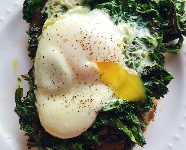 Boiled Kale with a Fried Egg and Toast